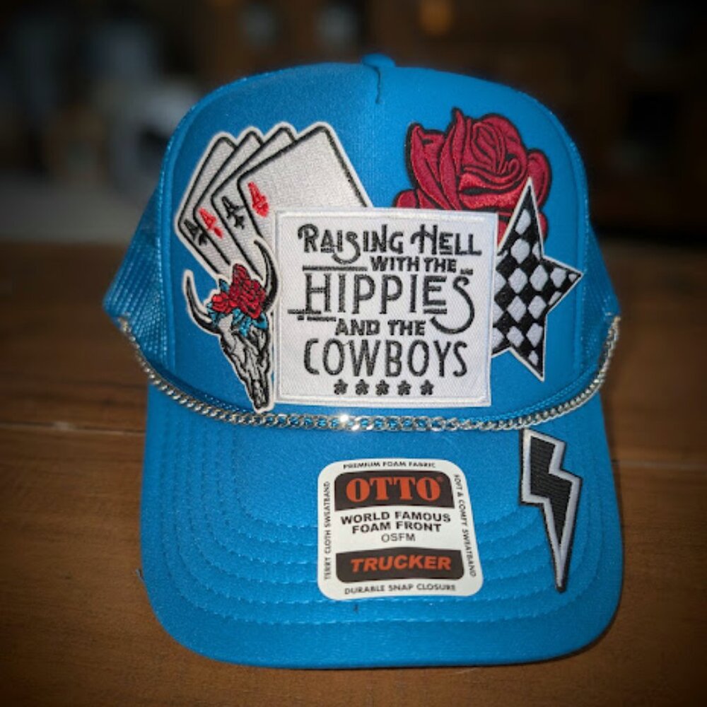 Trucker hat with iron patches and embellishments